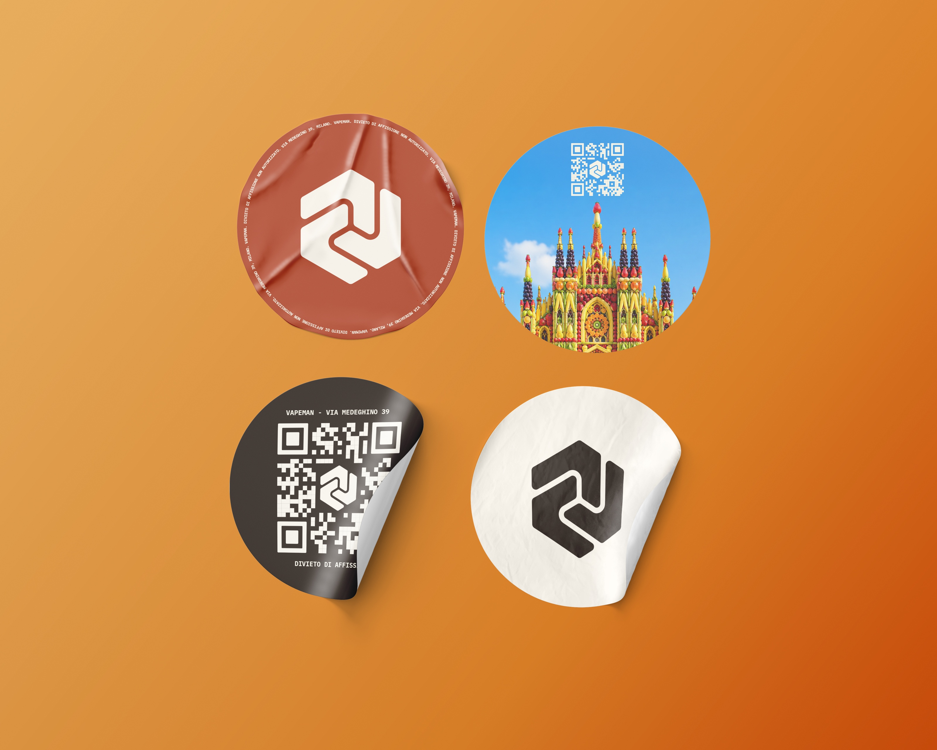 Four round stickers on an orange background: a brick red one with the white hexagon, one with a QR code over a photo of a brightly colored cathedral, a black one with a QR code and address, a white one with the hexagon in black.
