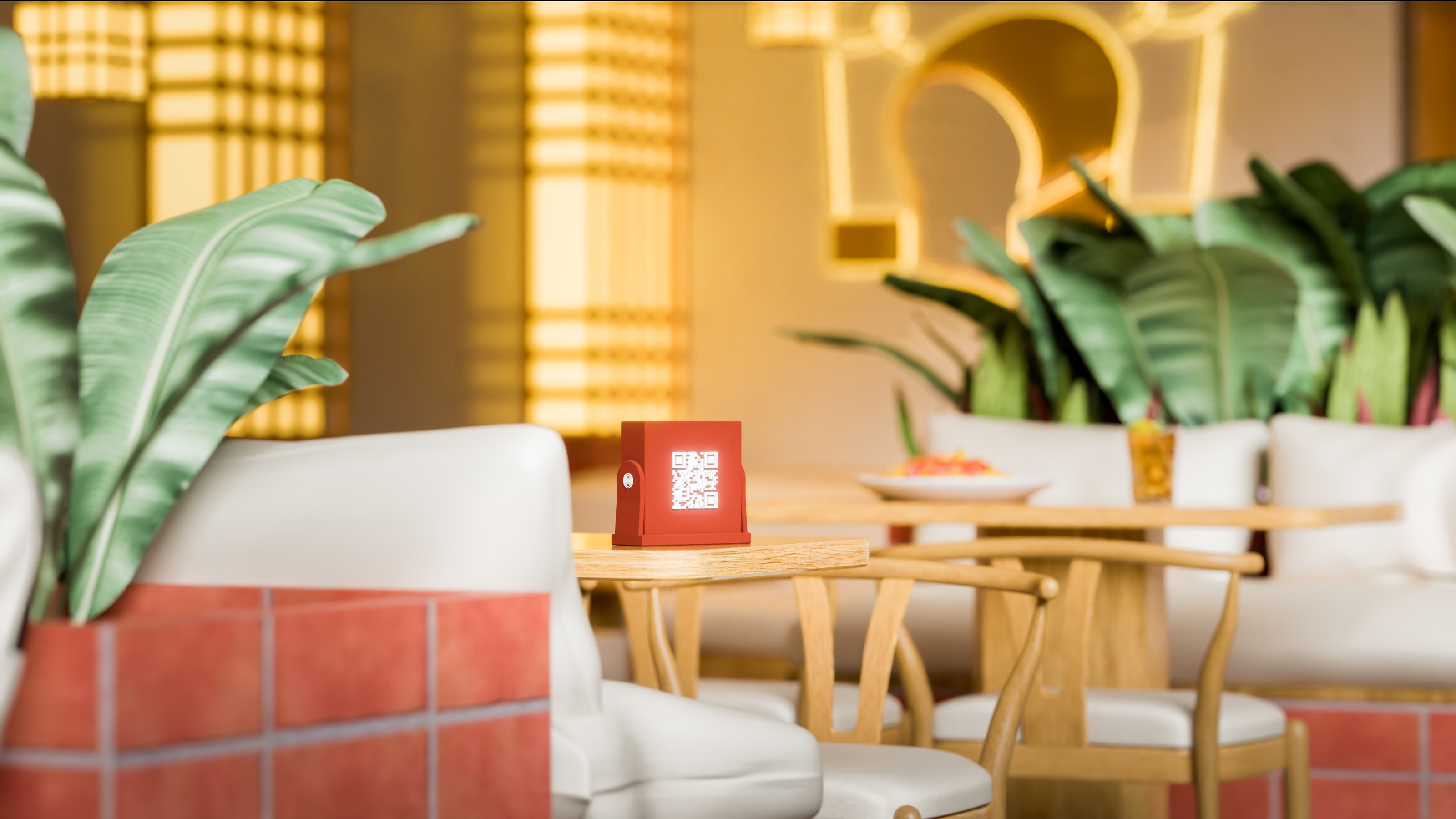 The red case on a table in a bright bar, among white seats, red tiles and plants.